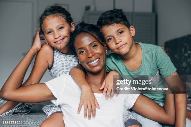 family hug - family with two children stock pictures, royalty-free photos & images