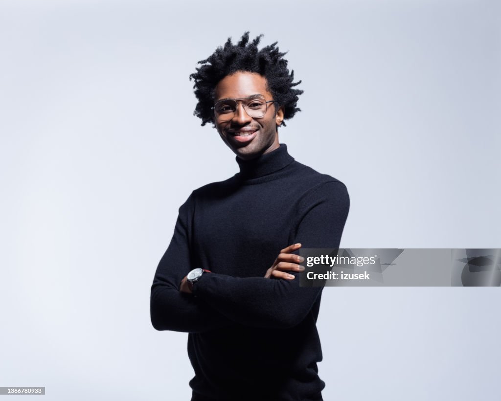 Portrait of confident man in black turtleneck