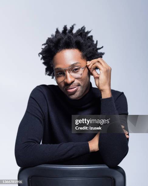 portrait of handsome man wearing turtleneck - black turtleneck stock pictures, royalty-free photos & images