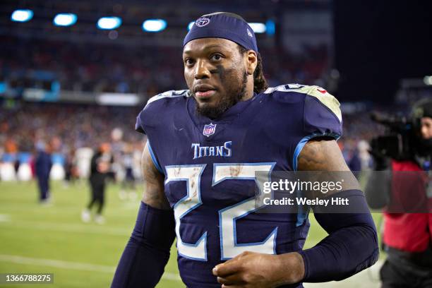 Derrick Henry of the Tennessee Titans walks off the field after a game against the Cincinnati Bengals in the AFC Divisional Playoff game at Nissan...