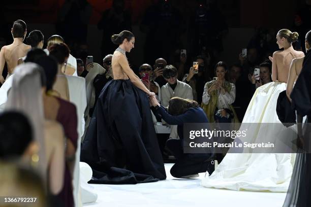 Nieves Alvarez and Stéphane Rolland walk the runway during the Stephane Rolland Haute Couture Spring/Summer 2022 show as part of Paris Fashion Week...