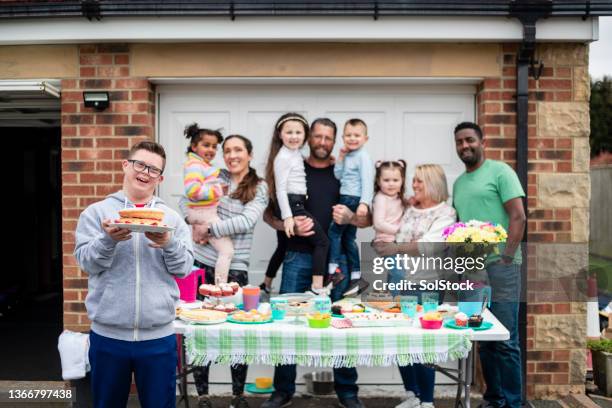 family having a bake sale - geographical locations stock pictures, royalty-free photos & images