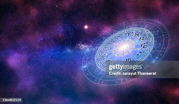 zodiac signs inside of horoscope circle. astrology in the sky with many stars and moons  astrology and horoscopes concept - star signs fotografías e imágenes de stock