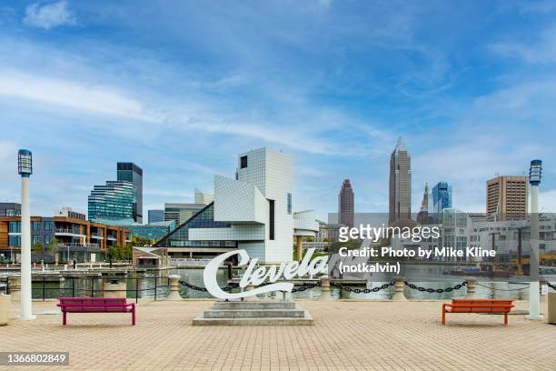 cleveland skyline from voinovich  park - cleveland ohio stock pictures, royalty-free photos & images