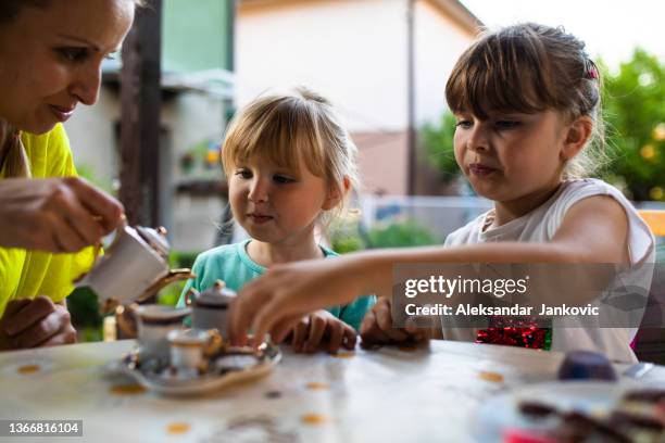 our little tea party - tea party stock pictures, royalty-free photos & images