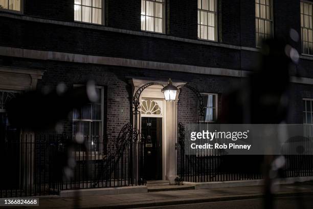 Downing Street is seen between a pair of TV lights at Downing Street on January 25, 2022 in London, England. The Met Police have announced an...