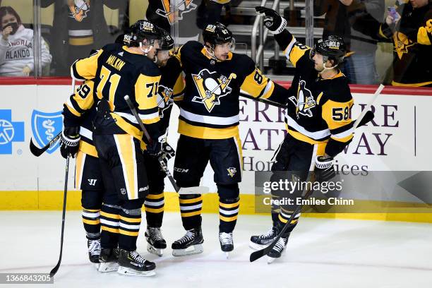 Sidney Crosby of the Pittsburgh Penguins celebrates his goal during a game between the Pittsburgh Penguins and Ottawa Senators at PPG PAINTS Arena on...