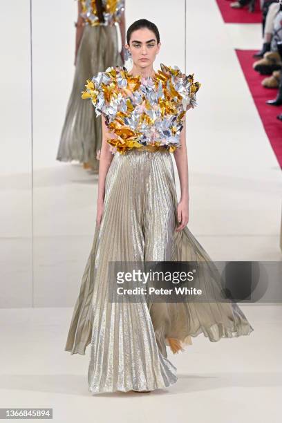 Model walks the runway during the Alexis Mabille Haute Couture Spring/Summer 2022 show as part of Paris Fashion Week at salle Pleyel on January 25,...