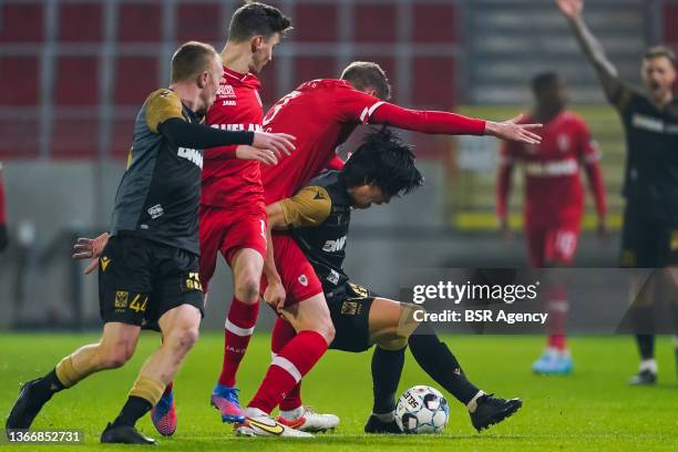 Bjorn Engels of Royal Antwerp FC and Daichi Hayashi of Sint-Truidense VV battle for possession during the Jupiler Pro League match between Royal...