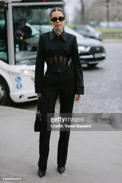 Guest poses after the Stephane Rolland show at the Theatre National de Chaillot during Paris Fashion Week - Haute Couture Spring/Summer 2022 on...