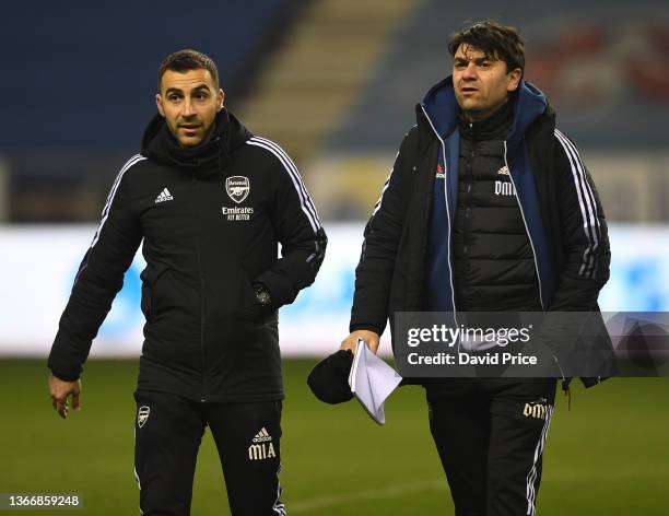 Mehmet Ali Arsenal U23 Assistant Coach and Dan Micciche the Arsenal U18 Head Coach before the Papa John's trophy Quarter Final match between Wigan...