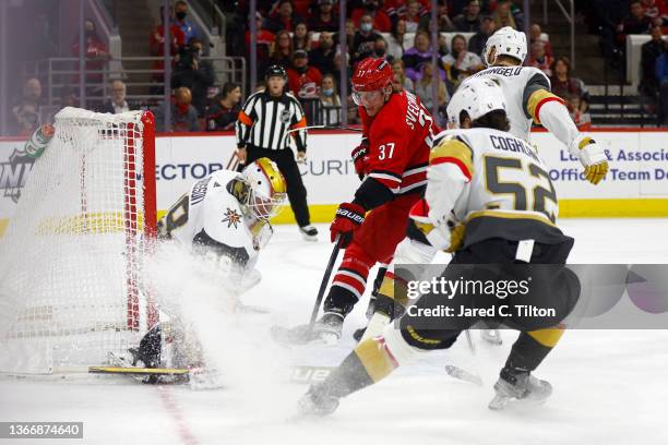 Laurent Brossoit of the Vegas Golden Knights denies a shot attempt from Andrei Svechnikov of the Carolina Hurricanes during the first period of the...