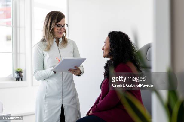 doctor returning to the doctor's office - entering hospital stock pictures, royalty-free photos & images