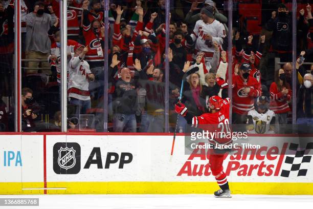 Sebastian Aho of the Carolina Hurricanes celebrates scoring the game-winning goal during overtime of the game against the Vegas Golden Knights at PNC...