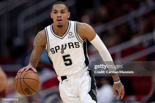Dejounte Murray of the San Antonio Spurs controls the ball during the second half against the Houston Rockets at Toyota Center on January 25, 2022 in...