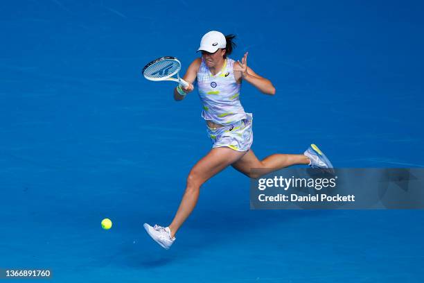 Iga Swiatek of Poland plays a forehand in her Women's Singles Quarterfinals match against Kaia Kanepi of Estonia during day 10 of the 2022 Australian...