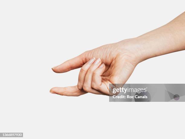 woman's hand holding, empty - 人差し指 女性 ストックフォトと画像