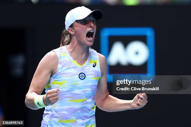 Iga Swiatek of Poland celebrates match point in her Women's Singles Quarterfinals match against Kaia Kanepi of Estonia during day 10 of the 2022...