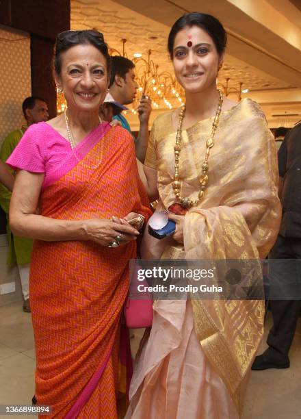 Tanuja and Kajol Devgn attend the North bombay sarbojanik durga Puja festivel on October 21,2012 in Mumbai, India.