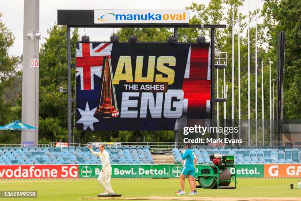 Australian captain Meg Lanning raises her arm as she inspects the pitch during a Women's Ashes series media opportunity at Manuka Oval on January 26,...