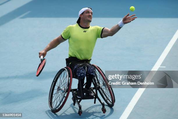 Gustavo Fernandez of Argentina serves in his Men's Wheelchair Doubles Final match with Shingo Kunieda of Japan against Alfie Hewett of Great Britain...