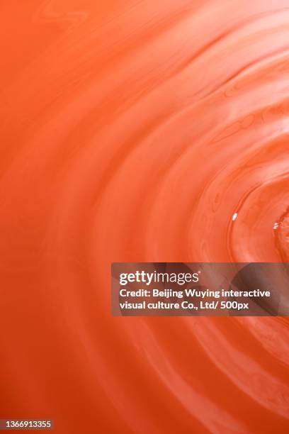 flowing red liquid background - tomato soup ストックフォトと画像