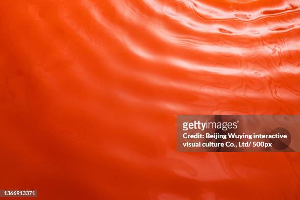 flowing red liquid background - tomato soup ストックフォトと画像