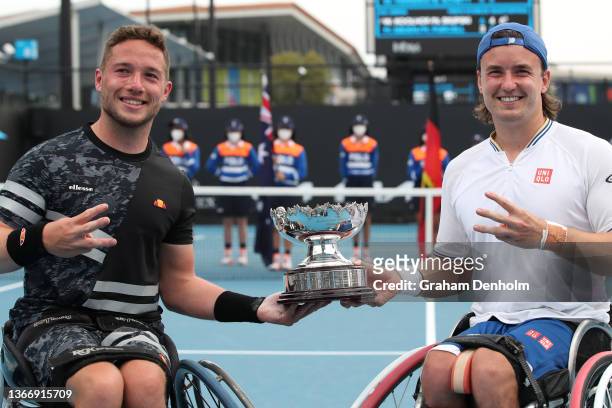 Alfie Hewett and Gordon Reid of Great Britain pose with the trophy after their victory in the Men's Wheelchair Doubles Final match against Gustavo...