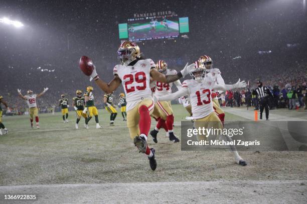 Talanoa Hufanga of the San Francisco 49ers celebrates after returning a blocked punt for a touchdown during the game against the Green Bay Packers in...