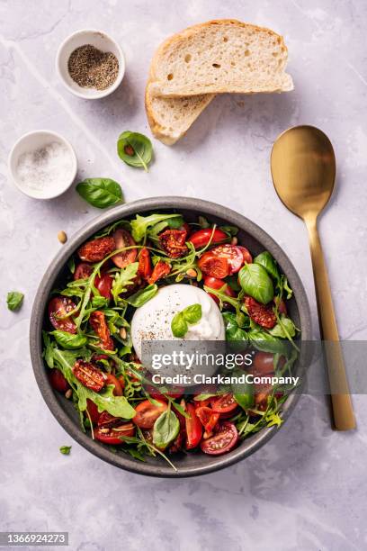 burrata with tomatoes and arugula - burrata stock pictures, royalty-free photos & images