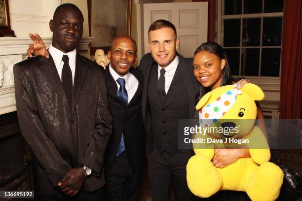 Gary Barlow attends a celebratory reception for BBC Children In Need hosted by Samantha Cameron at 10 Downing Street on January 10, 2012 in London,...