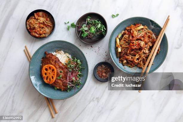 spicy korean beef noodles - korean culture stock pictures, royalty-free photos & images