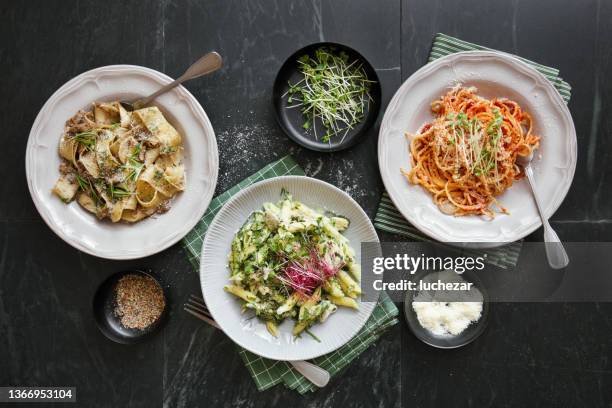 italian dishes for family dinner - pizza table top view stock pictures, royalty-free photos & images