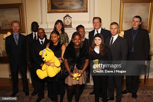 David Cameron, Samantha Cameron and Gary Barlow attend a celebratory reception for BBC Children In Need hosted by Samantha Cameron at 10 Downing...