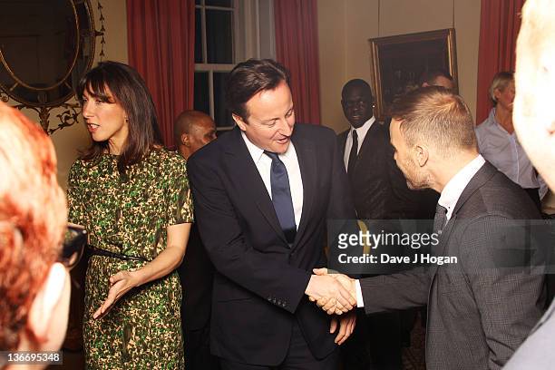 David Cameron, Samantha Cameron and Gary Barlow attend a celebratory reception for BBC Children In Need hosted by Samantha Cameron at 10 Downing...