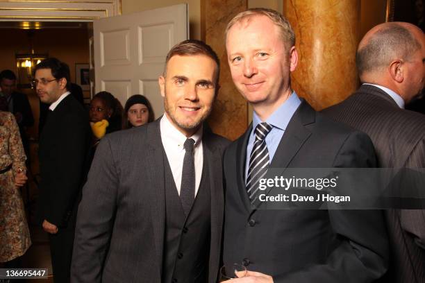 Gary Barlow and David Ramsden attend a celebratory reception for BBC Children In Need hosted by Samantha Cameron at 10 Downing Street on January 10,...