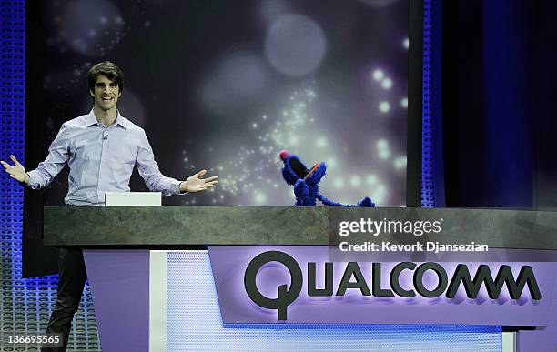 Sesame Street muppet charachter Grover appears during a presentation by Qualcomm at the 2012 International Consumer Electronics Show at The Venetian...