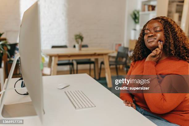 young african-american  woman having tooth pain - toothache stock pictures, royalty-free photos & images