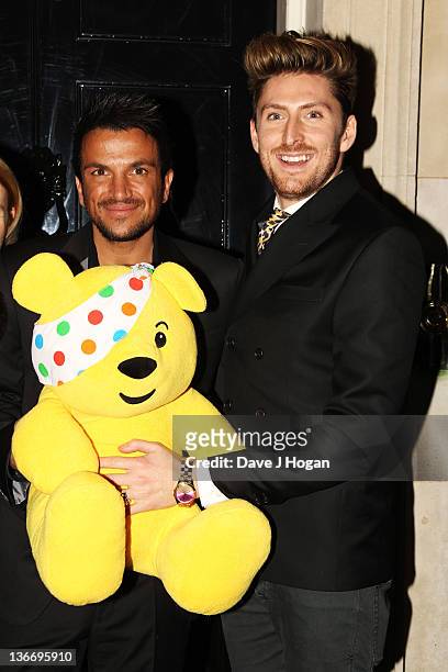 Peter Andre and Henry Holland attend a celebratory reception for BBC Children In Need hosted by Samantha Cameron at 10 Downing Street on January 10,...