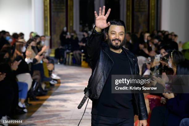 Designer Zuhair Murad acknowledges the crowd during the Zuhair Murad Haute Couture Spring/Summer 2022 show as part of Paris Fashion Week on January...