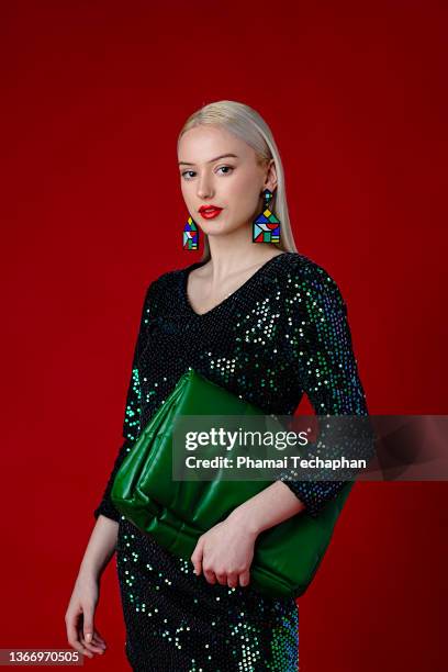 stylish woman in green dress - multi colored dress bildbanksfoton och bilder