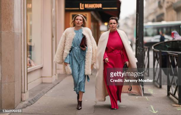 Two fashion week guests are seen outside Alexis Mabille during Paris Fashion Week Haute Couture Spring/Summer 2022 on January 25, 2022 in Paris,...