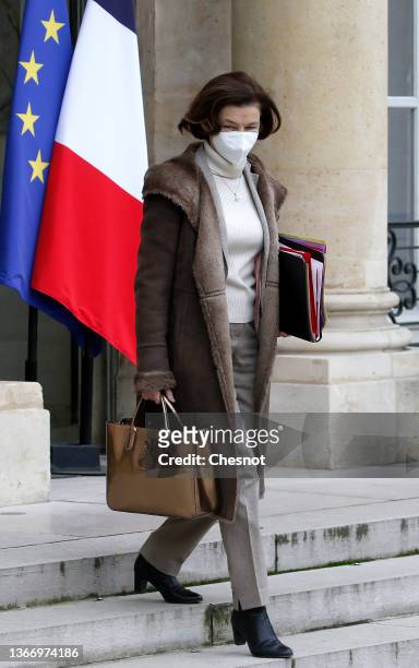 French Defence Minister Florence Parly wearing a protective face mask leaves the Elysee Presidential Palace after the weekly cabinet meeting on...