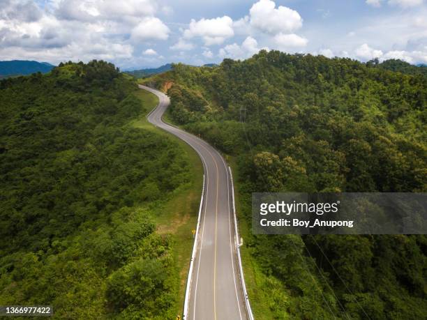 aerial view of beautiful steep curved road (look like number 3) on the high mountain way to bo kluea district in nan province, thailand. - long road bildbanksfoton och bilder