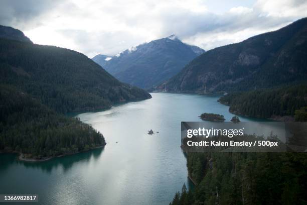 diablo lake washington,scenic view of river amidst mountains against sky,whatcom county,washington,united states,usa - lake whatcom bildbanksfoton och bilder