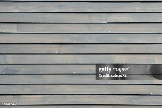 clapboard house siding in new gray, background design element - weatherboard stock pictures, royalty-free photos & images