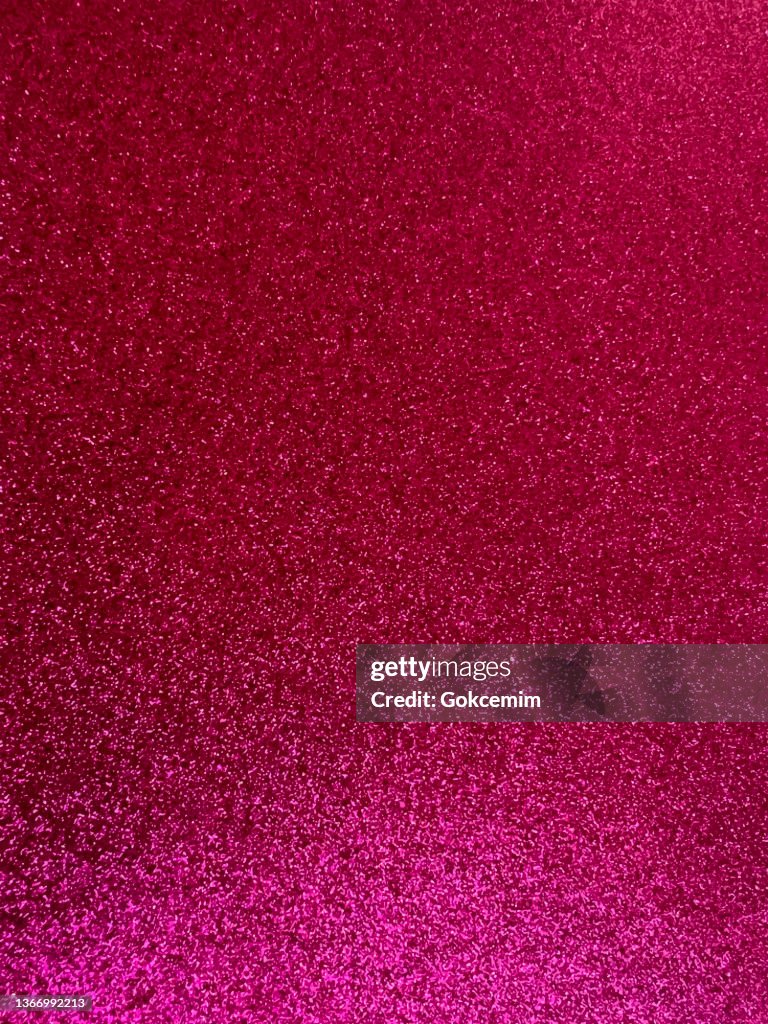Abstract Background with Pink Glittering Brush Stroke. Pink Foil Shiny Grunge Texture.