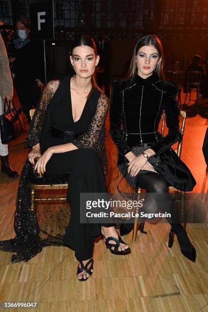 Ophelie Guillermand and Valery Kaufman attend the Elie Saab Haute Couture Spring/Summer 2022 show as part of Paris Fashion Week at Le Carreau Du...