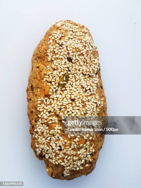 various snacks,directly above shot of bread on white background,denpasar selatan,indonesia - vollkornbrot stock-fotos und bilder