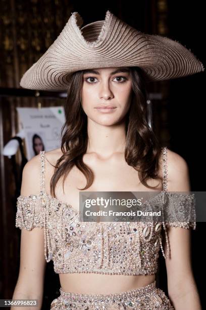 Model prepares backstage prior to the Zuhair Murad Haute Couture Spring/Summer 2022 show as part of Paris Fashion Week on January 26, 2022 in Paris,...